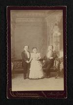 Photograph: M. Lavinia Warren standing with Primo and Ernesto Magri, black mat (version 1)